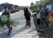 Satgas Madago Raya Bersama Pelajar MAN 1 Poso Kerja Bakti 