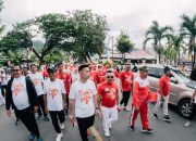 Sambut HUT ke-80 RI, Pemkab Banggai Bersama Masyarakat Gelar Kirab Merah Putih Bentangkan Bendera Sepanjang 1 KM